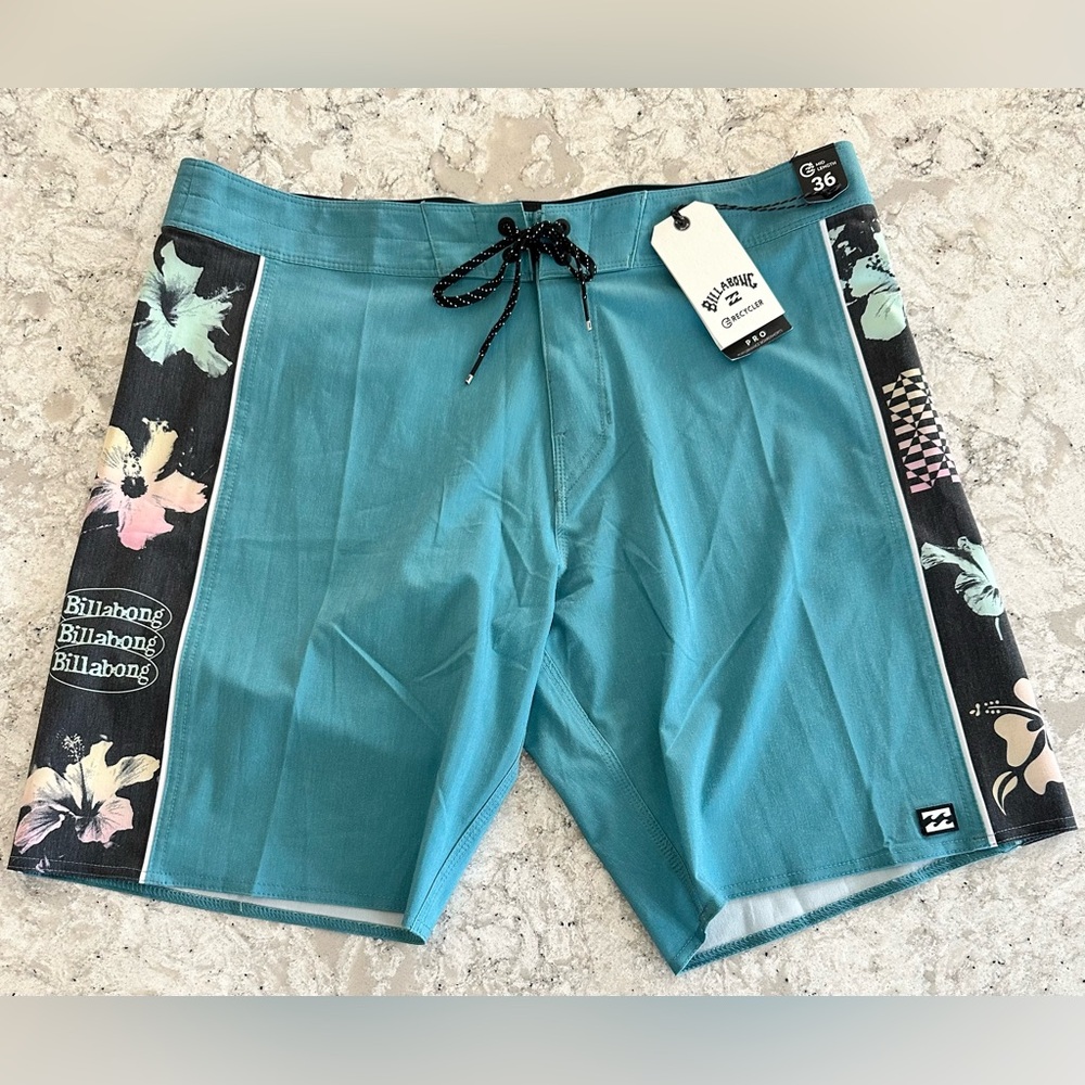 Billabong Men's Teal with Floral print on the sides Board Shorts NWT 36